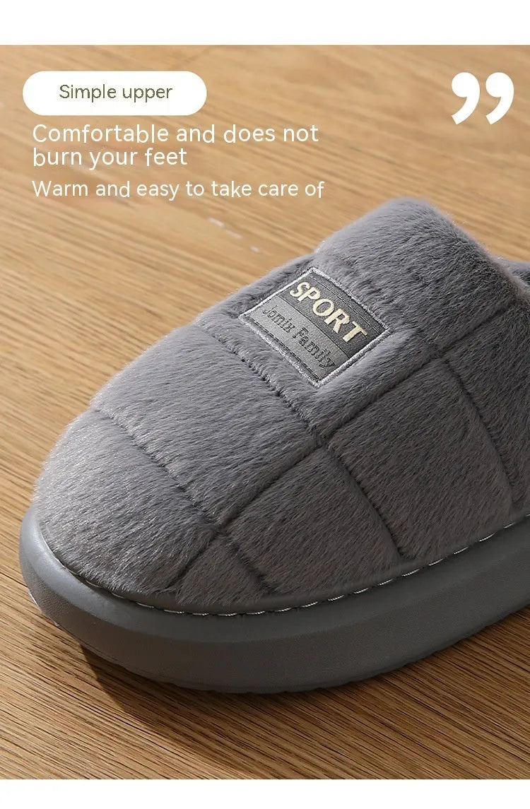 Men's grey plaid rabbit hair slippers with a thick sole, shown on a wooden floor.