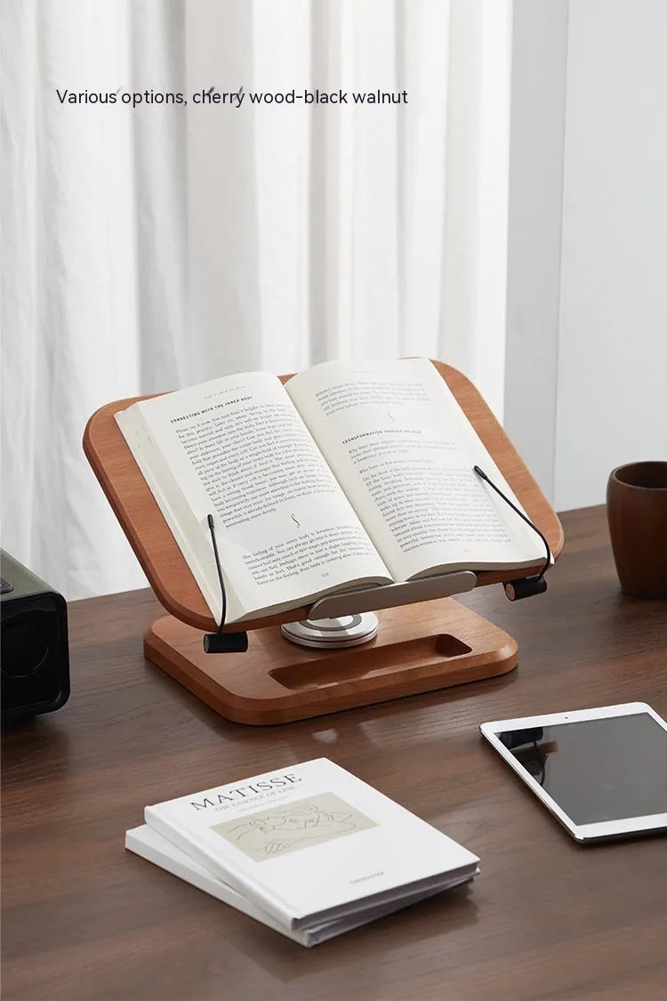 Walnut-coloured solid wood adjustable reading rack holding a book.