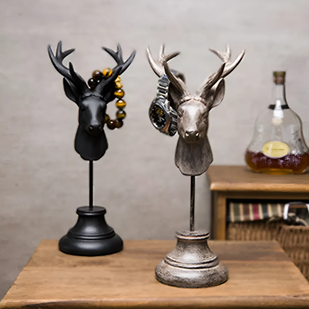 Tall black natural resin animal sculpture decoration on a wooden shelf.