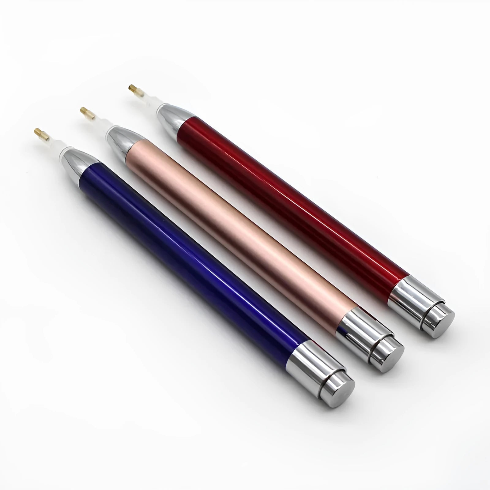 Aluminium alloy luminous drill pen for diamond painting in gold, red, or blue colour.