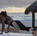 Women's black high-waist workout leggings with night-glowing prints made from milk silk fabric