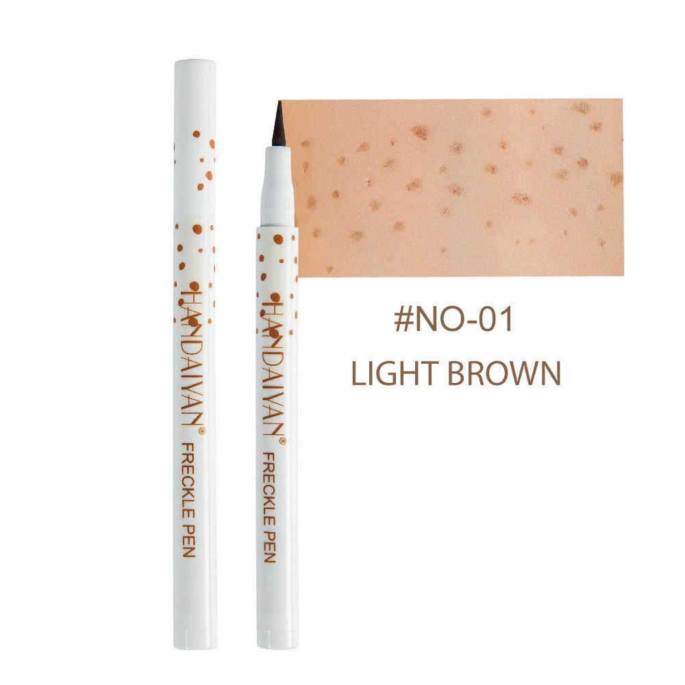 Dark brown cosmetic freckle pen with precision tip for waterproof face and body makeup.