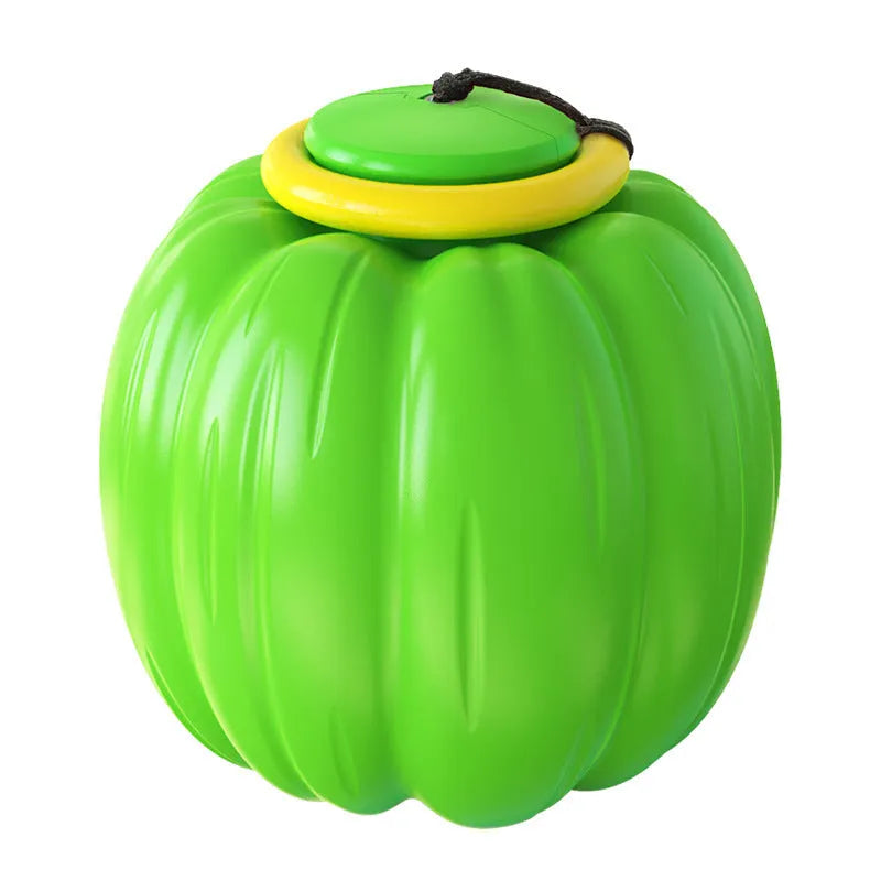 Green, orange, and yellow pumpkin-shaped squeaker dog ball toy for small dogs, shown with size scale.