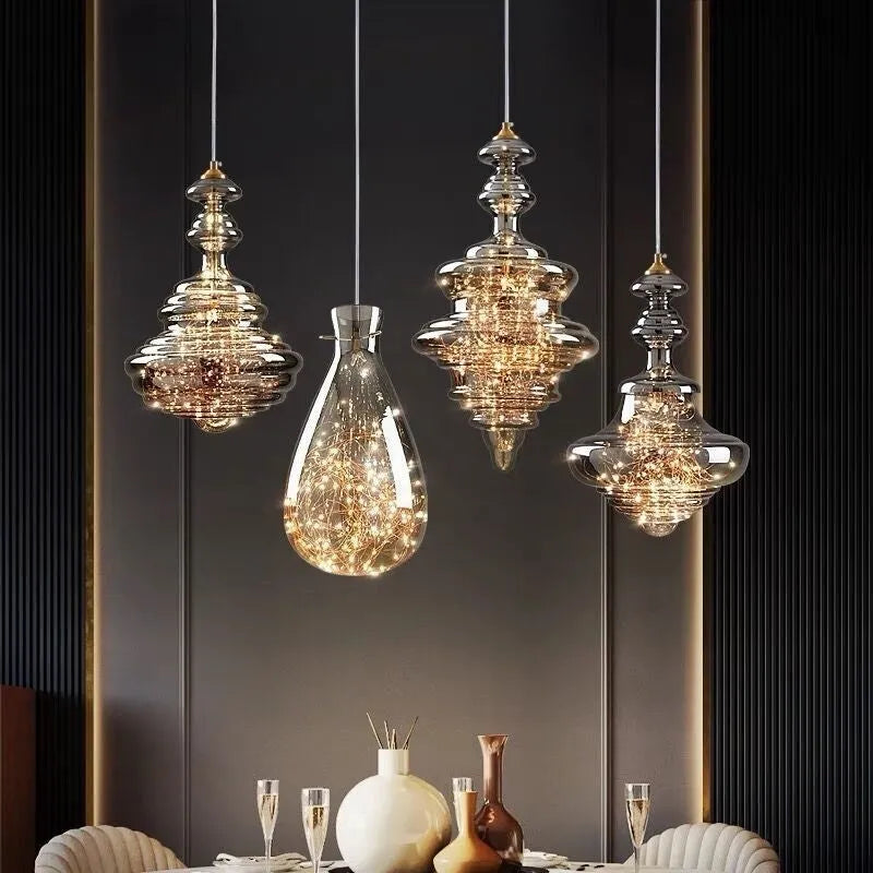 Modern glass droplight chandelier with adjustable height mechanism showing glass construction