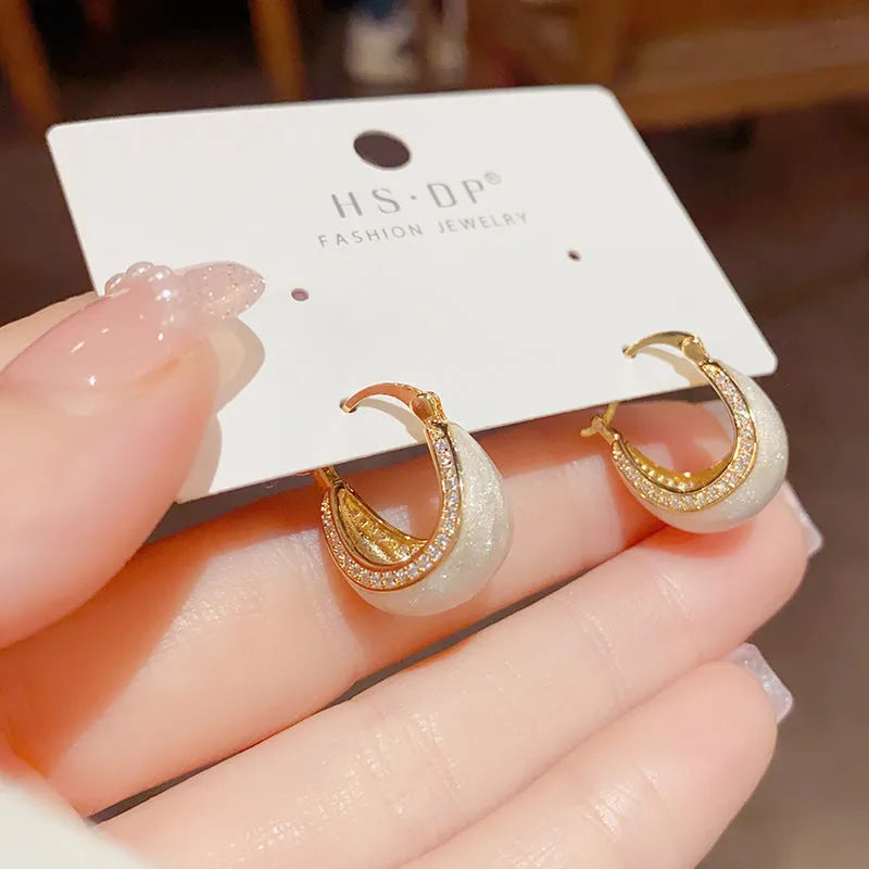Retro geometric copper earrings with micro-inlaid drip design and real gold plating in white finish