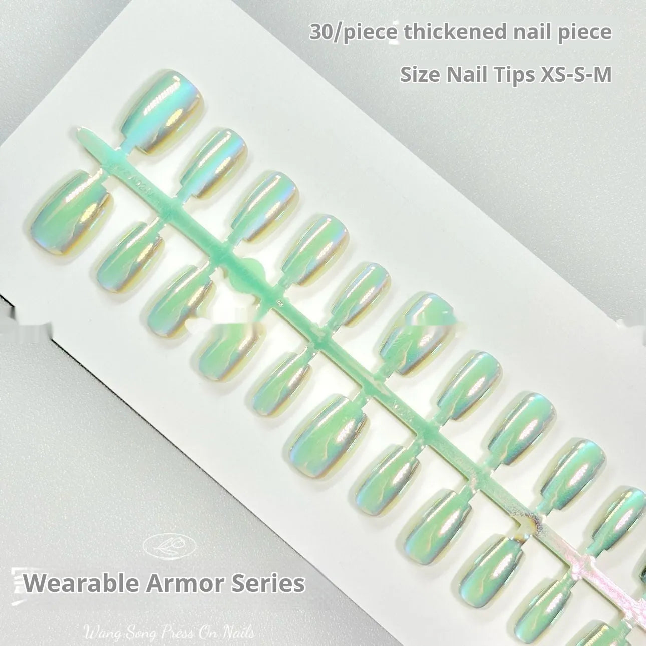 Set of electroplated Cat's Eye and aurora design false nails in short ladder XS, S, and M sizes.