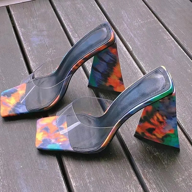 Women's black square toe slipper with thick triangular high heel, made from PU leather with a rubber sole.