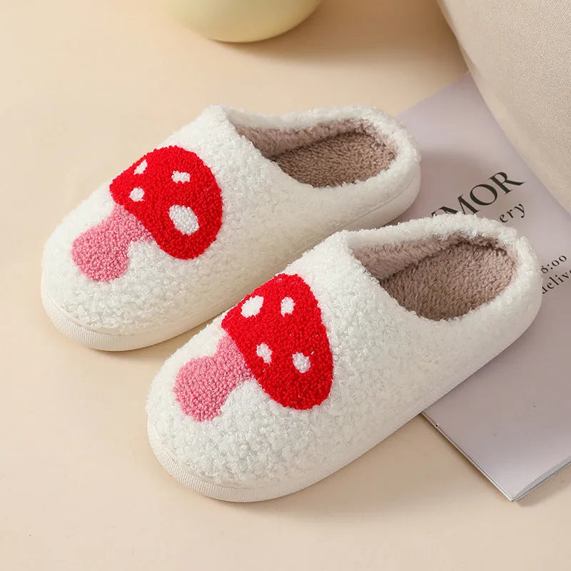 Women's plush cartoon love style home slippers with a non-slip PVC sole.