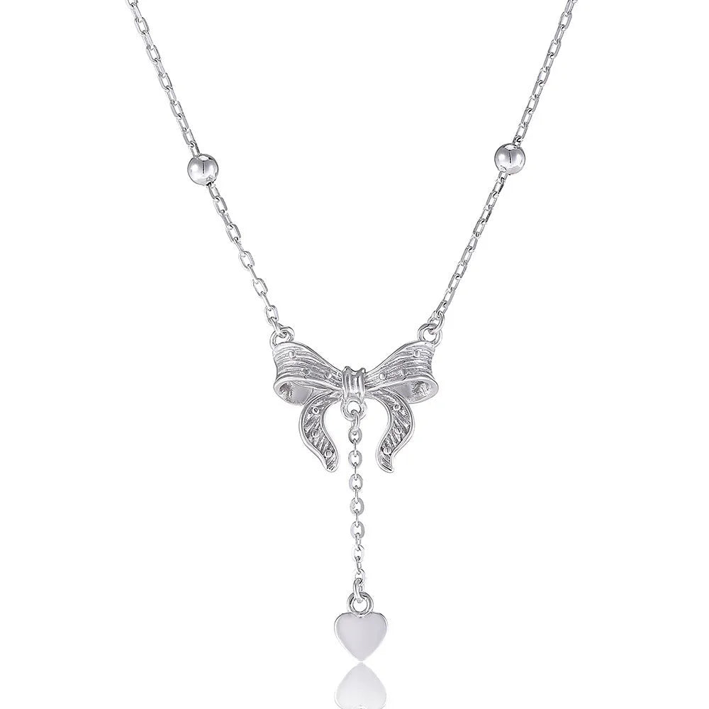 S925 silver necklace with heart and bow pendant on an O-ring chain
