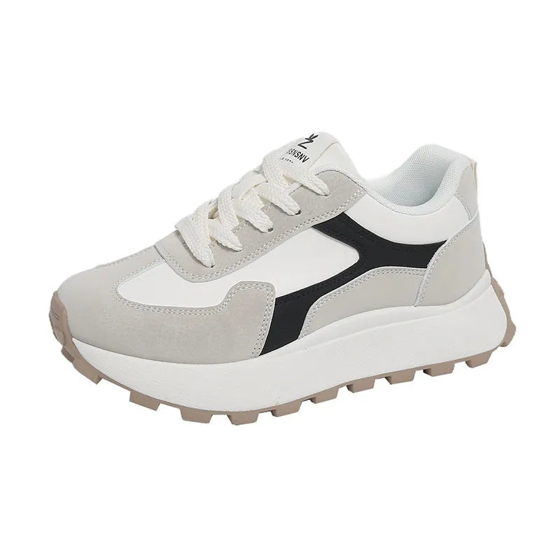 Women's solid-colour platform sneakers with mesh upper and flat rubber sole.