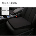 Black rectangular car seat cushion for heightening, approximately 42cm by 39cm by 6cm thick.