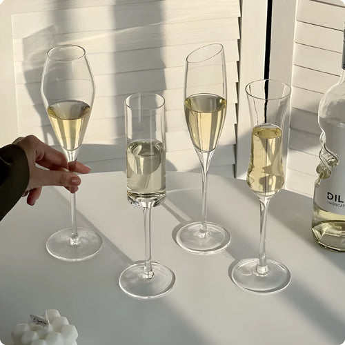 Clear crystal champagne glasses set showing seven different design styles including flute and goblet shapes