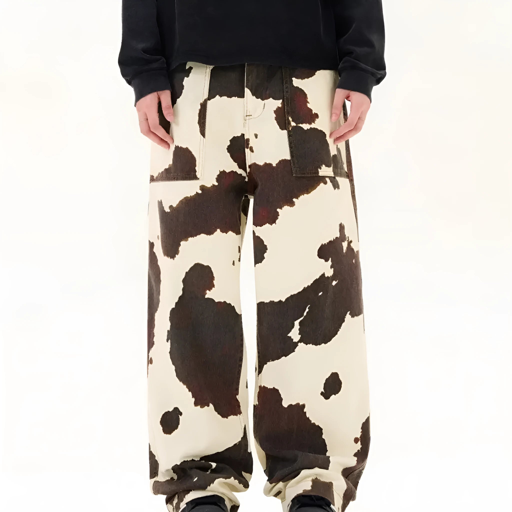 Men's straight-leg casual trousers with a retro-style cows print pattern on a cotton-polyester fabric.