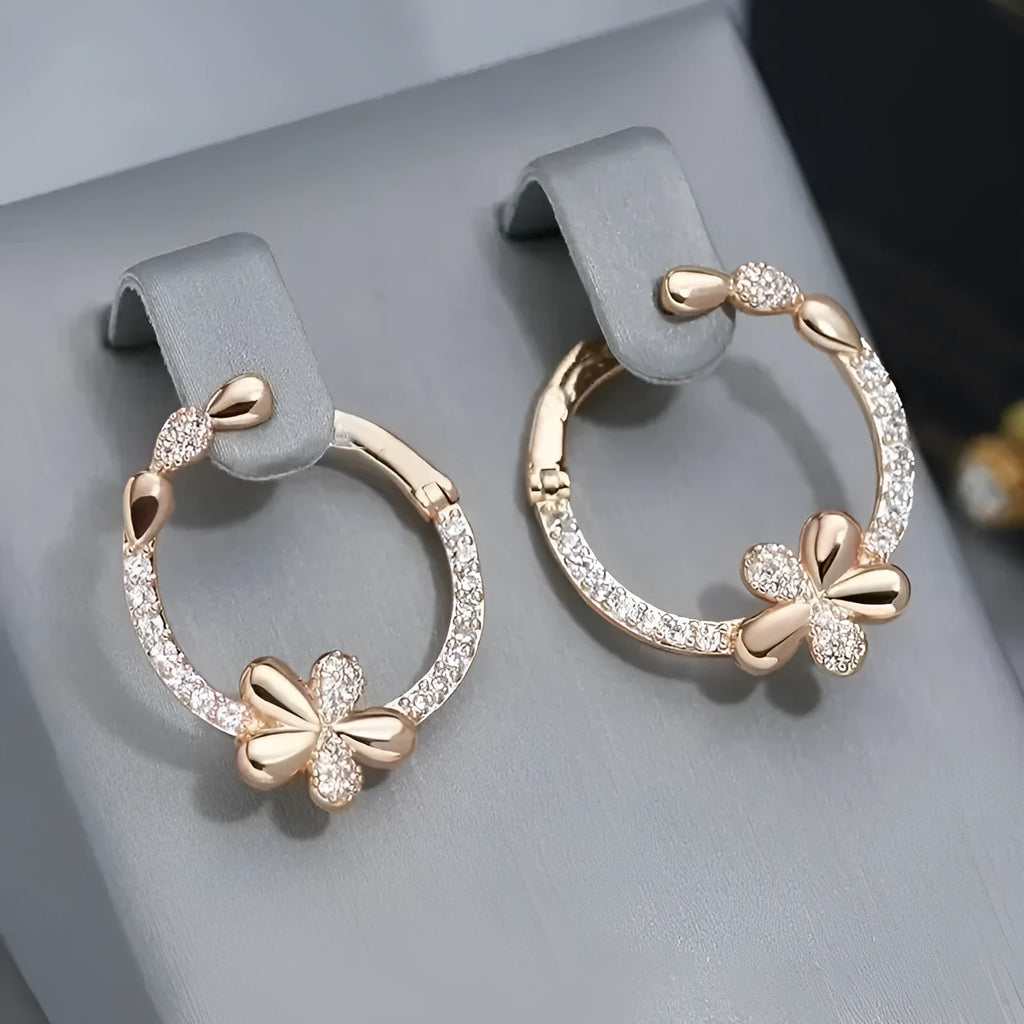 Women's round ring earrings in electroplated copper with geometric design