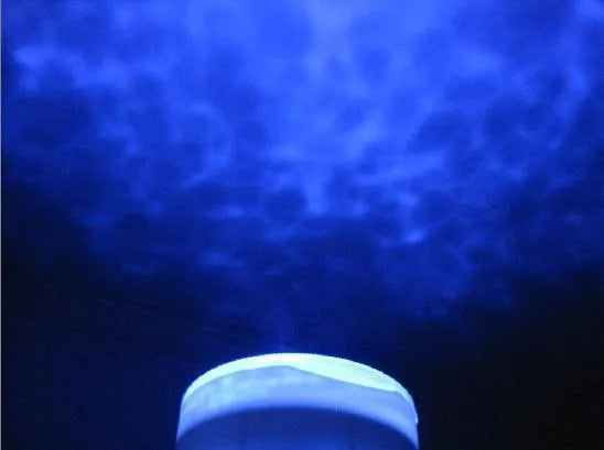 Blue coloured ocean theme projection lamp with DLP correction for children's rooms.