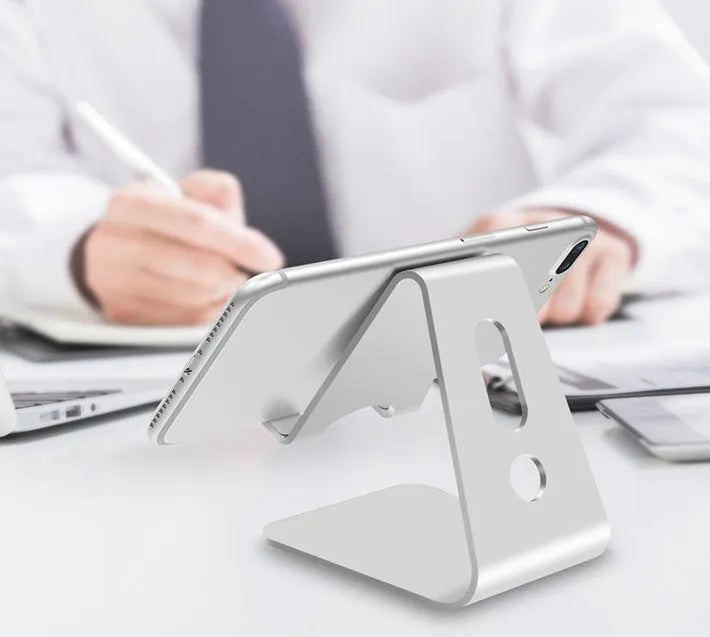 Aluminium alloy universal phone and tablet stand in black, red, rose gold, and silver colour options.