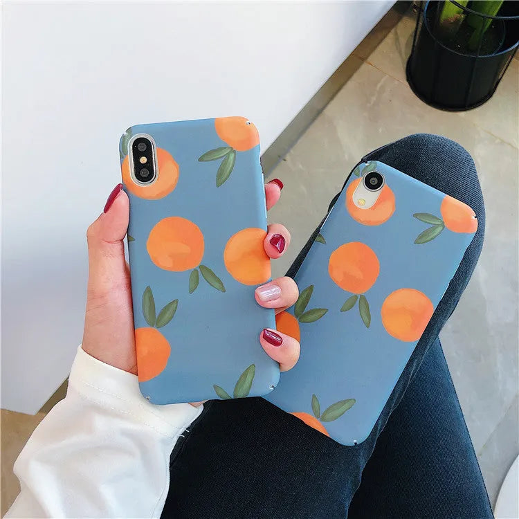Orange plastic iPhone case with retro-style water and blue background design.