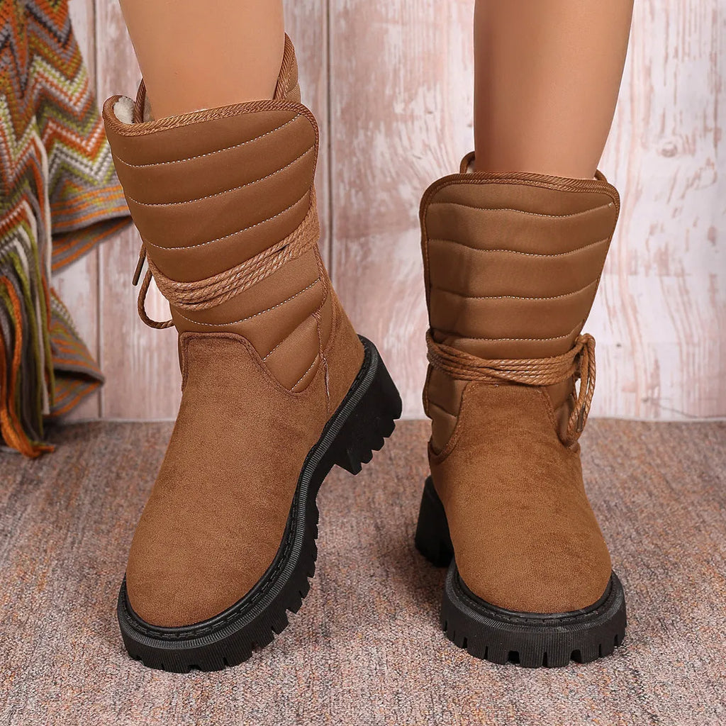 Women's black chunky heel snow boots with lace-up design and fleece lining