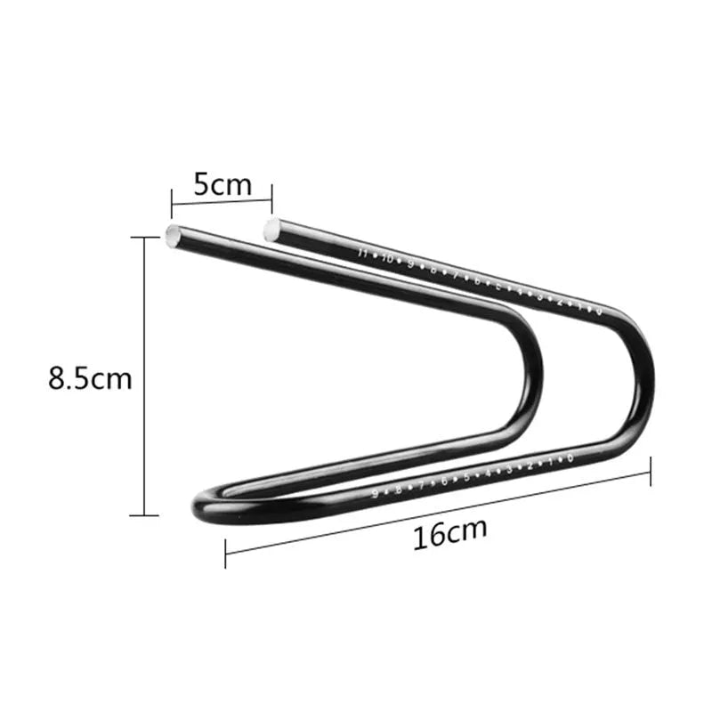 Black bicycle seatpost suspension device on bike showing spring steel alloy construction
