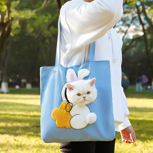 Canvas pet carrier backpack with cartoon design for shoulder carrying of cats and small dogs