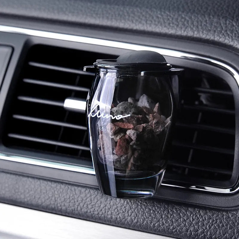Car air outlet aromatherapy with glass perfume seat and zeolite fragrance block for long-lasting scent