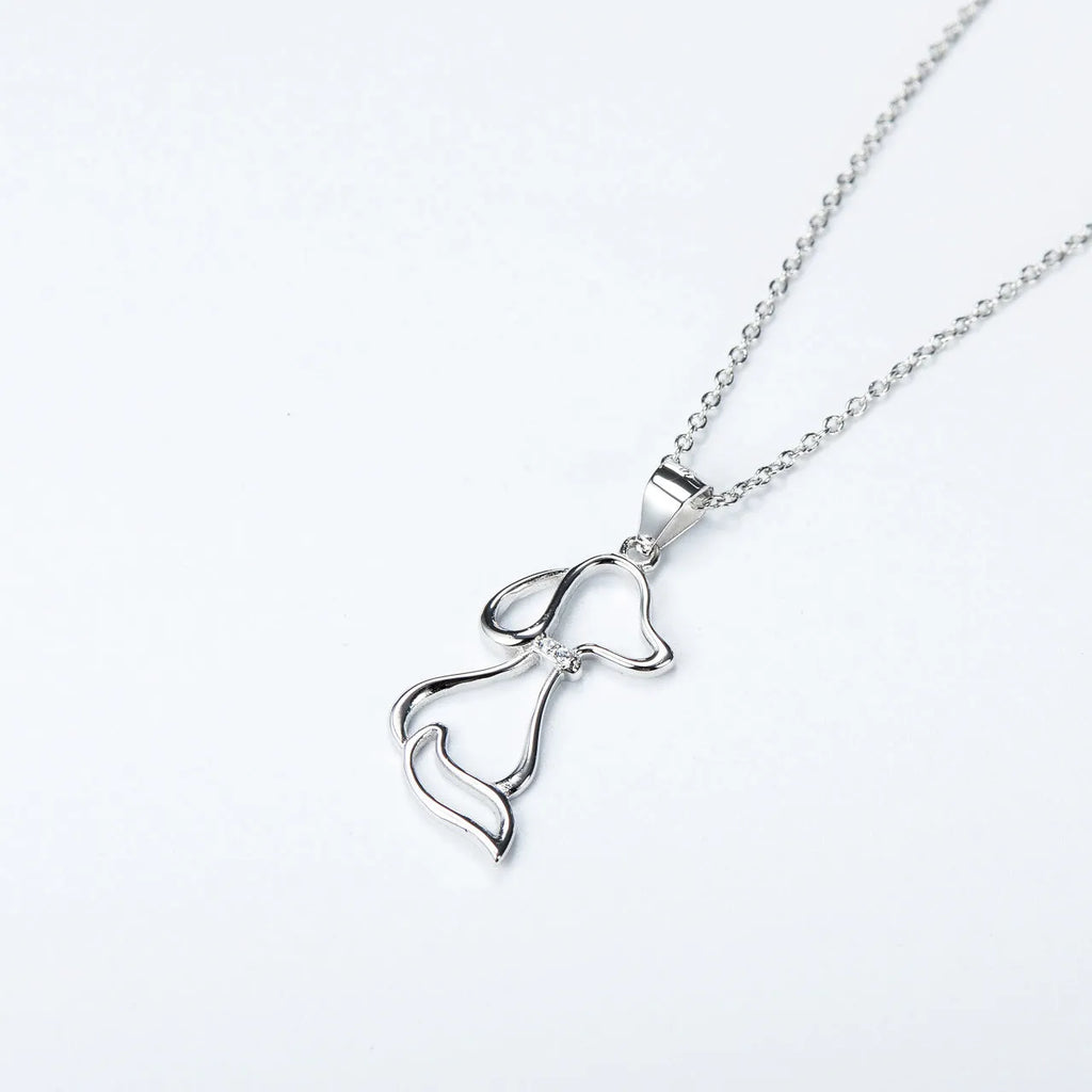 925 sterling silver dog pendant necklace with round bead chain on display