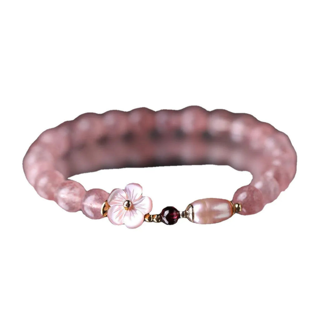 Strawberry quartz peach blossom bracelet with crystal beads and floral charm on adjustable chain