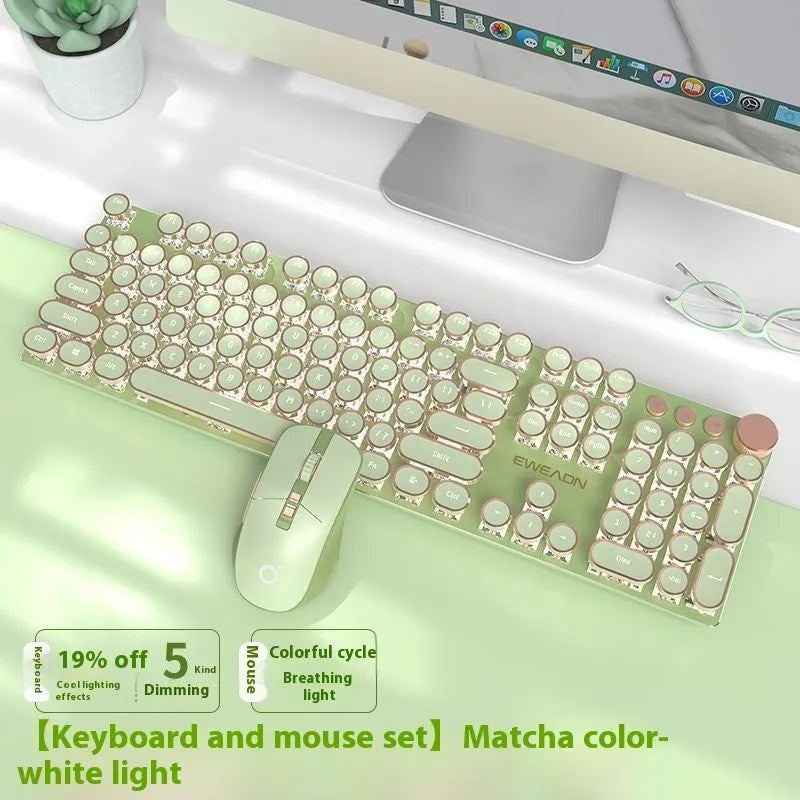 Matcha green mechanical gaming keyboard with white backlighting, aluminium panel, and multifunction knob on desk