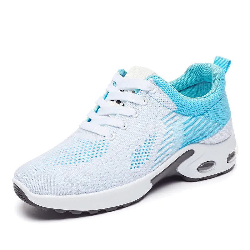 Women's Flyknit casual running shoes in pink with lace-up front and flat PVC sole.