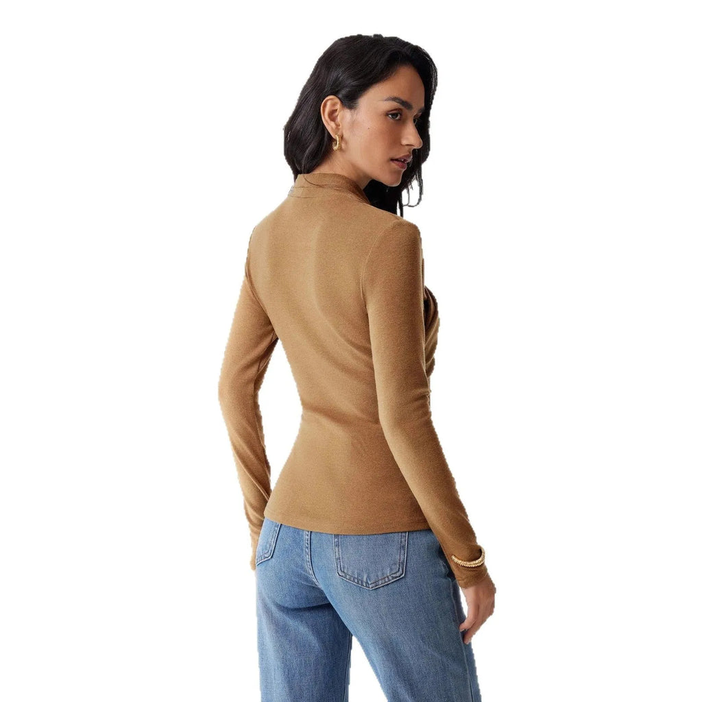 Camel coloured women's slim fit long sleeve pullover sweater on a hanger.