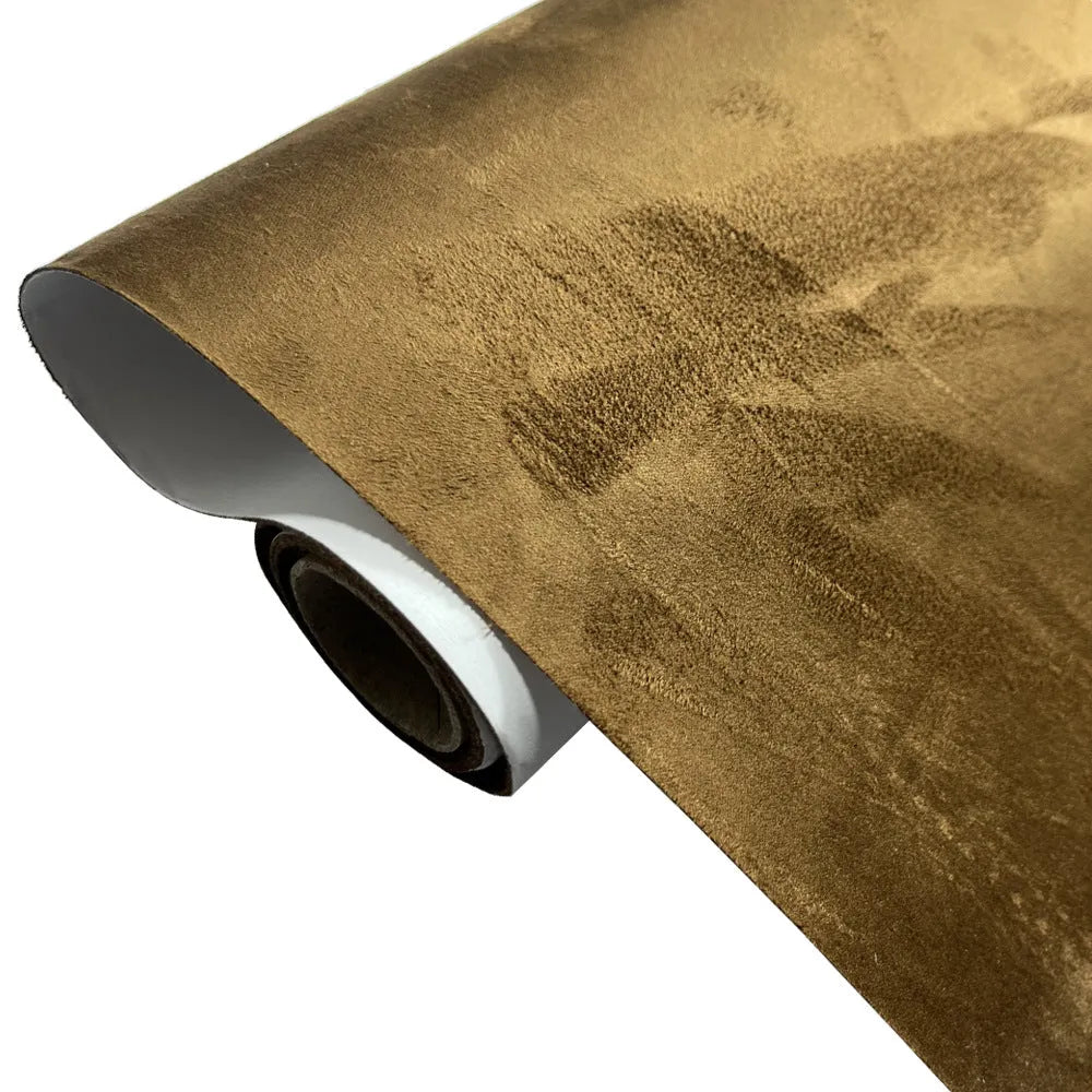 A sheet of self-adhesive black leather suede material with a ruler showing its 0.5mm thickness.