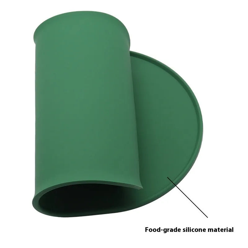 Silicone waterproof cat feeding placemat in beige colour on a wooden floor
