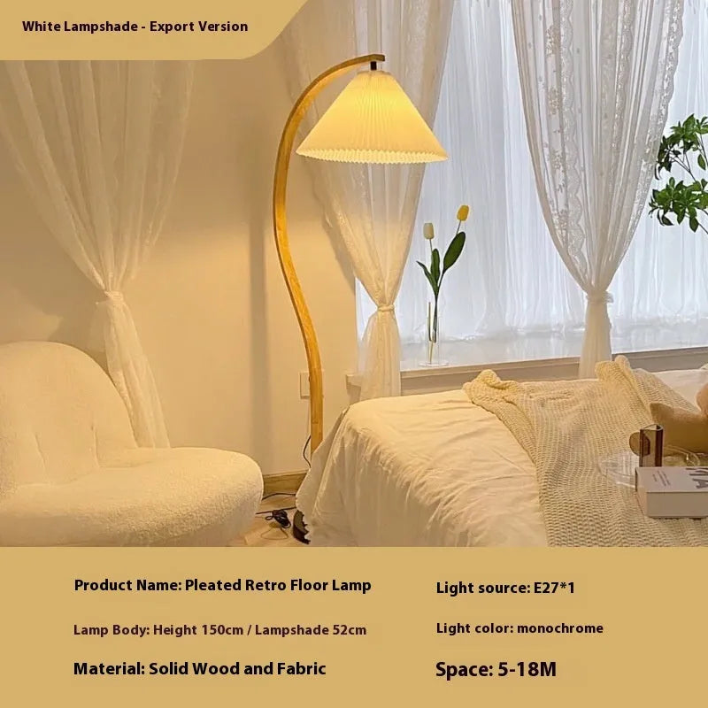 Retro vertical table lamp with fabric shade in white or red, showing three-colour light settings.