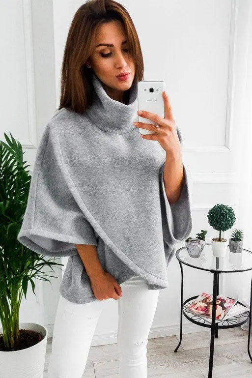 Women's longline batwing sleeve cardigan sweatshirt in a fake two-piece design, shown in a neutral colour.
