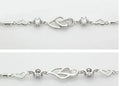 S925 sterling silver double heart bracelet with purple amethyst gemstone on white background