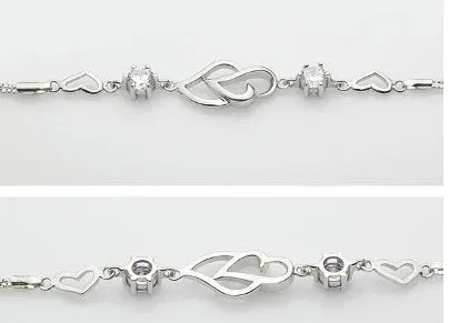 S925 sterling silver double heart bracelet with purple amethyst gemstone on white background