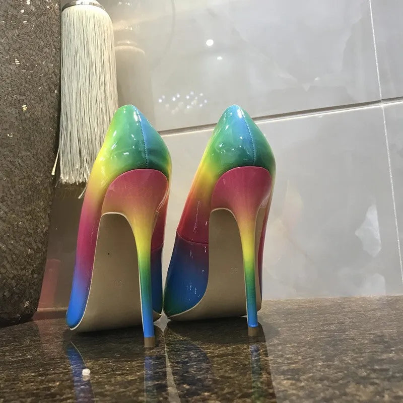 Rainbow glossy patent leather high heel shoes with pointed toe and thin ultra-high heel.