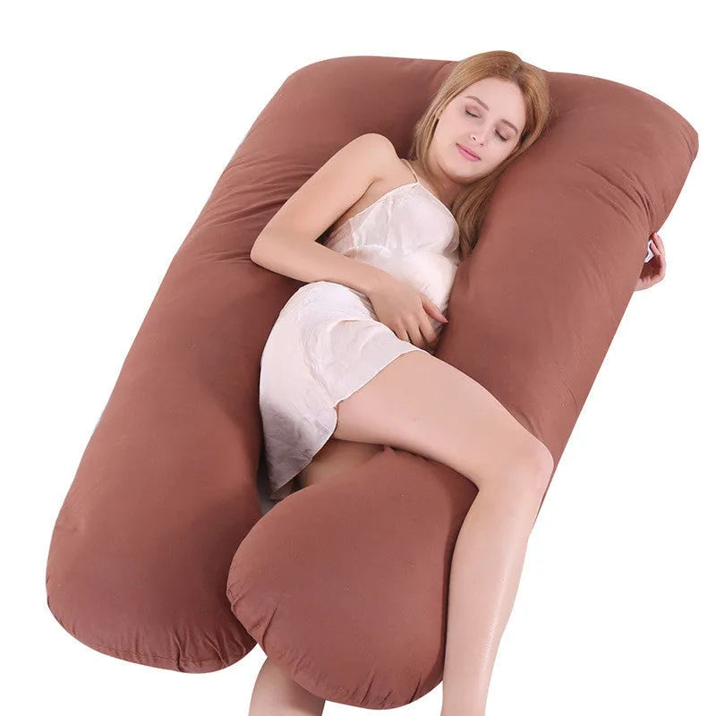 Large U-shaped pregnancy support pillow with removable cover in choice of fabrics.