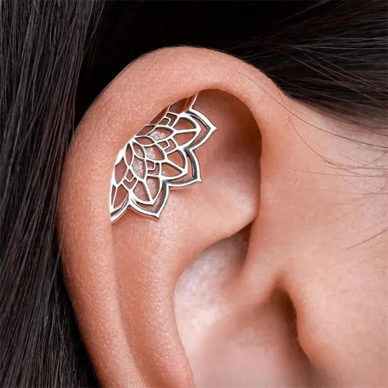 Spider web pattern stud earrings in electroplated gold and silver metal finishes