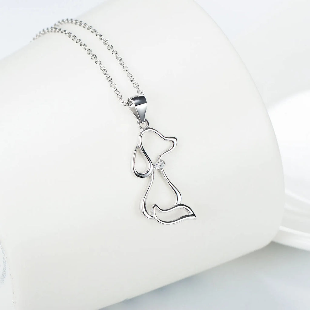 925 sterling silver dog pendant necklace with round bead chain on display