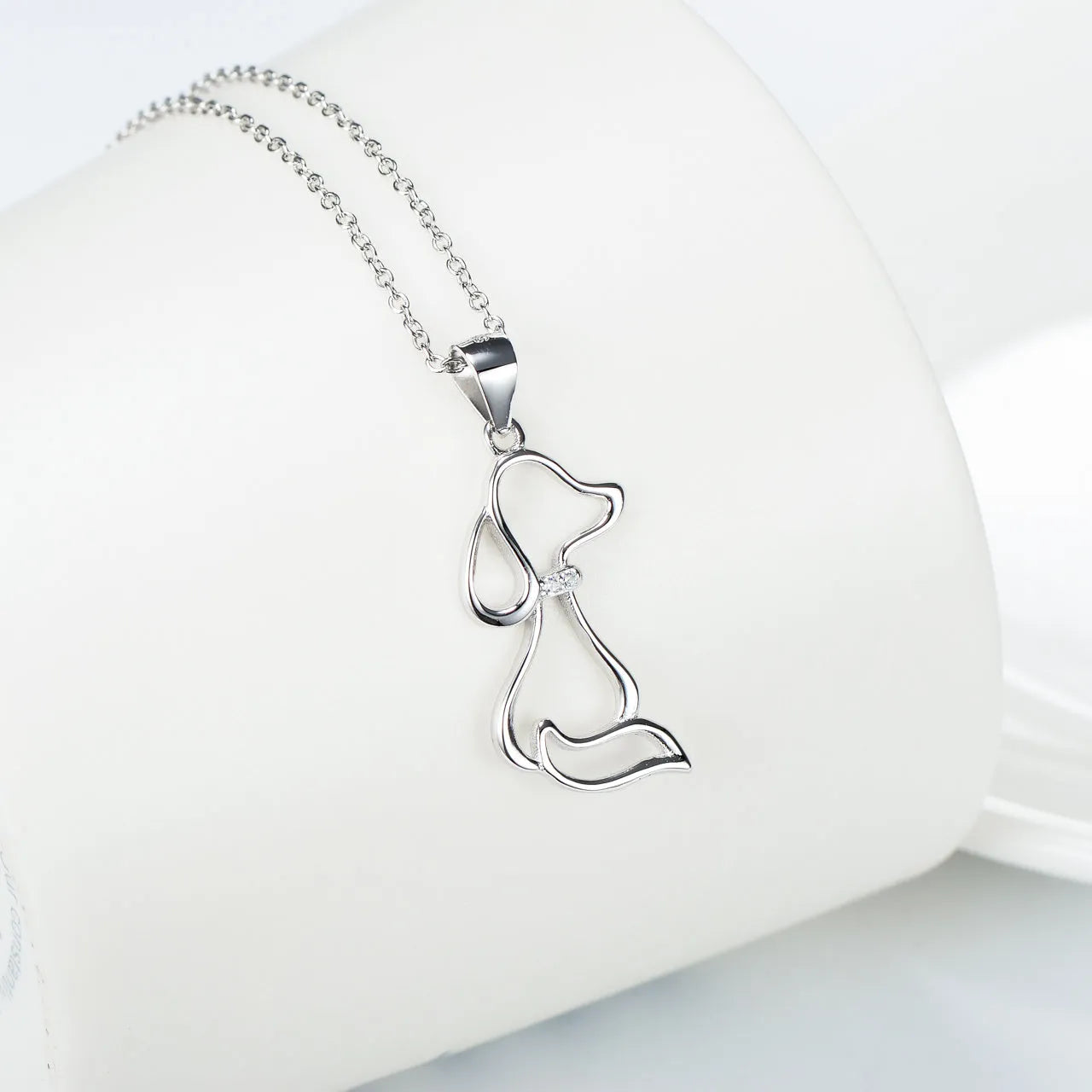 925 sterling silver dog pendant necklace with round bead chain on display