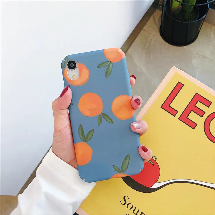 Orange plastic iPhone case with retro-style water and blue background design.
