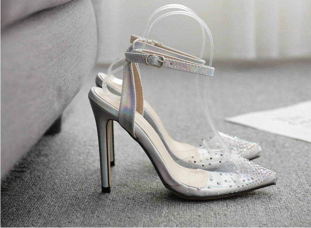 Women's pointed toe stiletto sandals with diamond detail on the PVC upper.