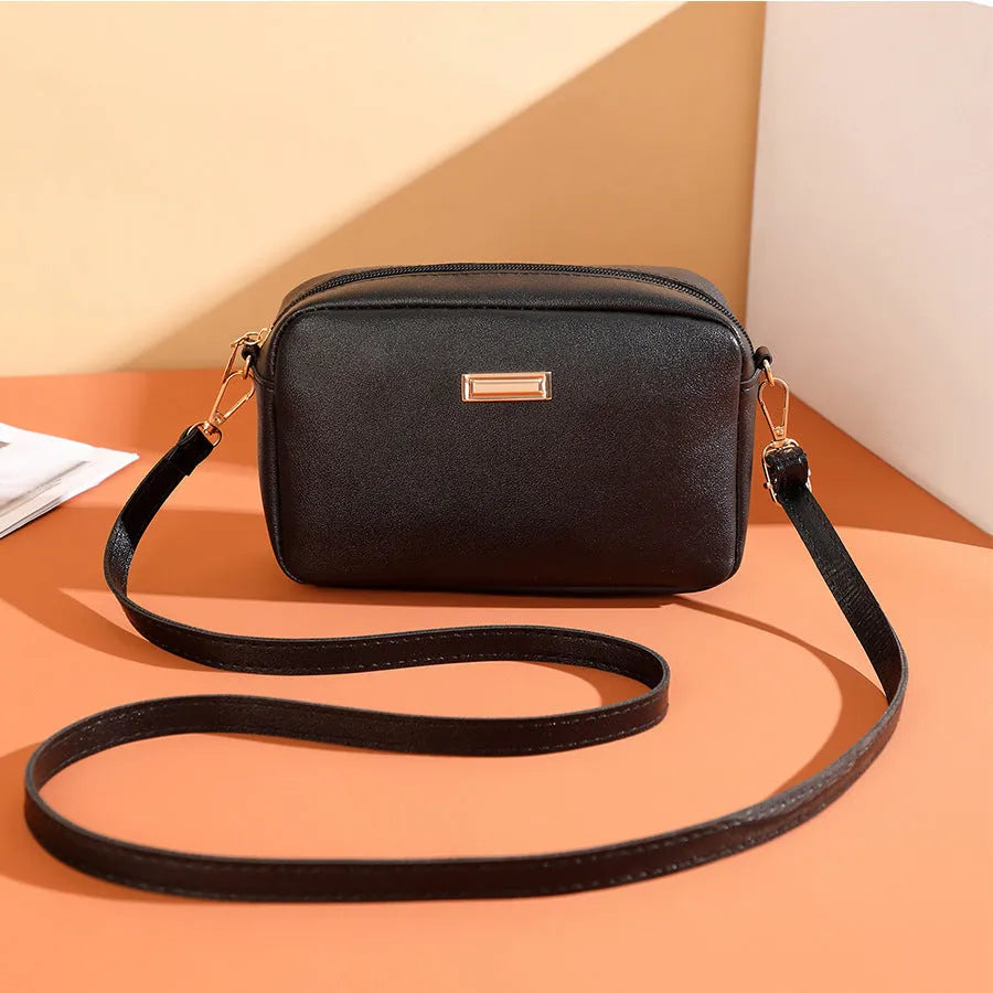 Women's solid colour PU leather shoulder bag with three-dimensional pockets in five colour options