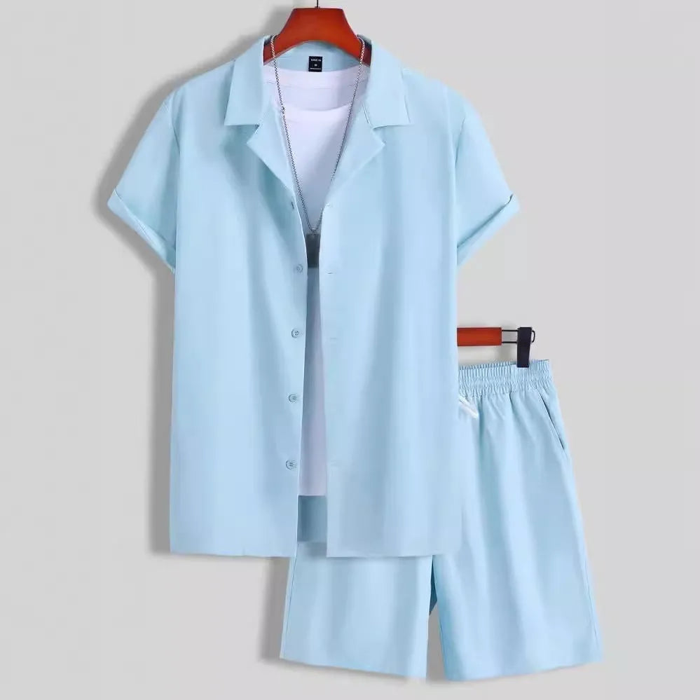 Men's white short sleeve Cuban collar sport shirt and matching shorts laid flat.