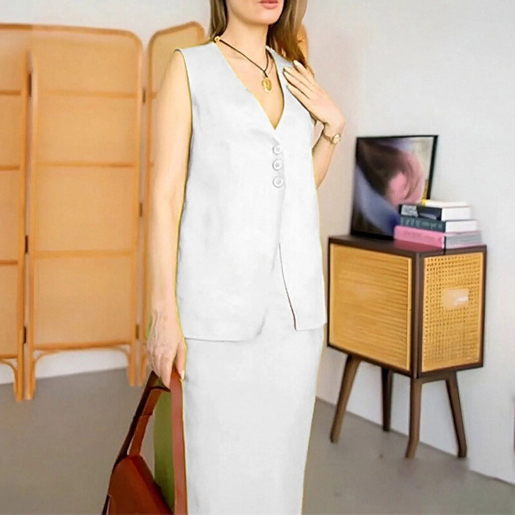 Women's blue polyester two-piece set with sleeveless vest and long skirt on a hanger.