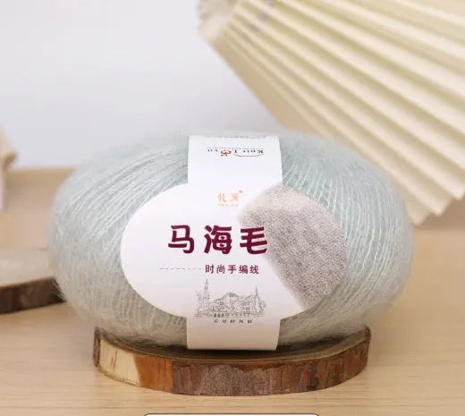 Mohair wool ball for DIY scarf knitting in assorted colours on white background