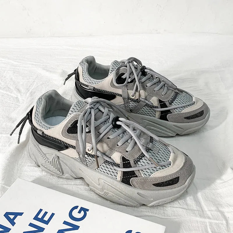 Men's white platform dad sneakers with lace-up front and chunky sole for height increase.