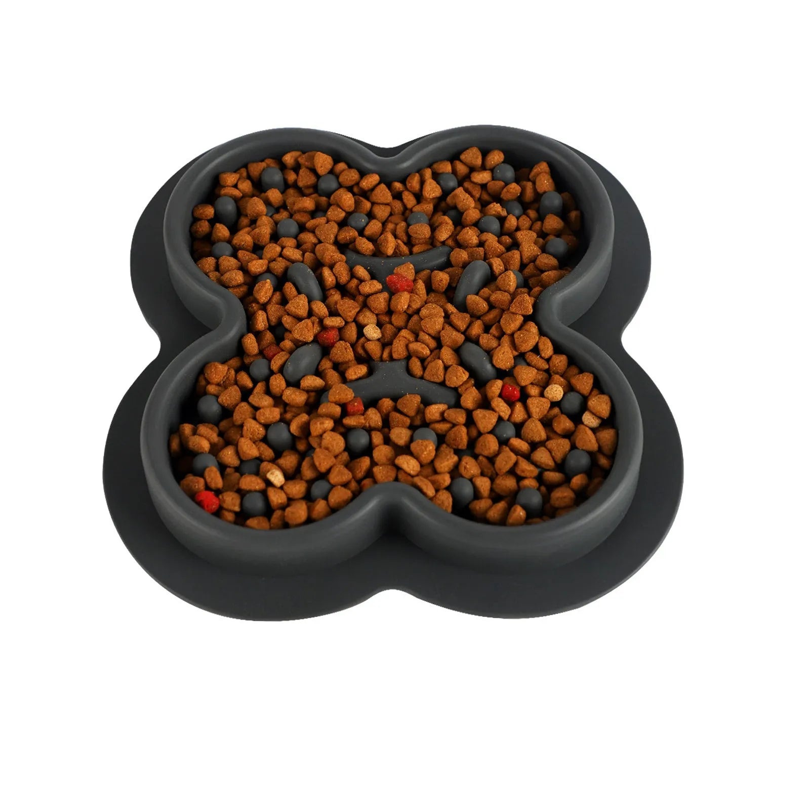 Silicone pet slow feeder licking mat with raised edges in assorted colours on a kitchen floor.