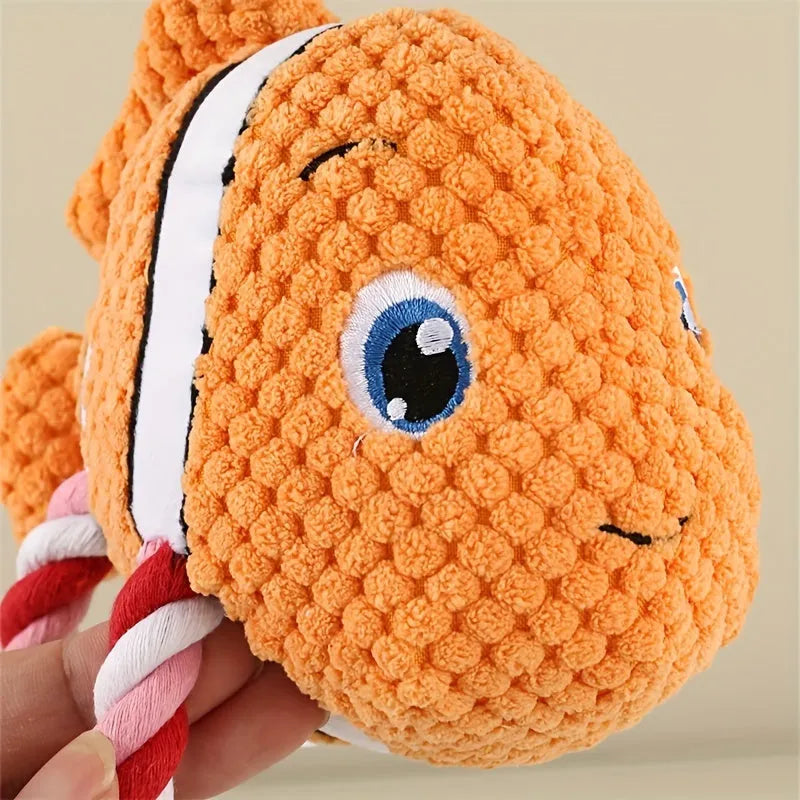 Turtle shaped dog chewing toy with knotted rope centre in grey green or orange colours